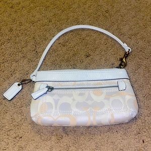 Authentic mini coach wristlet